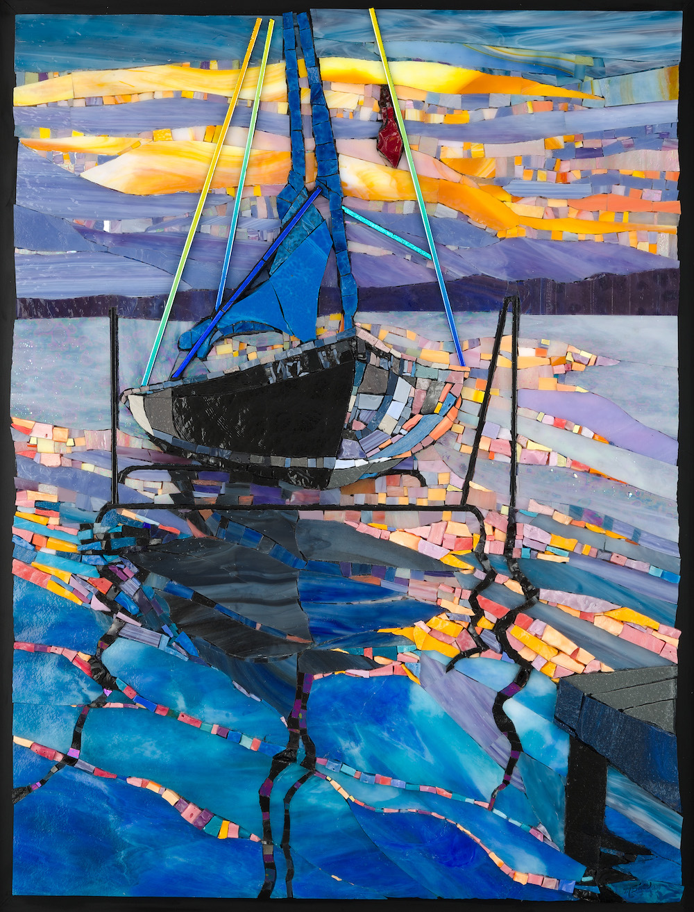 Glass mosaic of a sailboat with blue sails and a dark hull gliding across rippling water, silhouetted dock posts in the foreground, and a layered purple-and-gold sunset sky above.